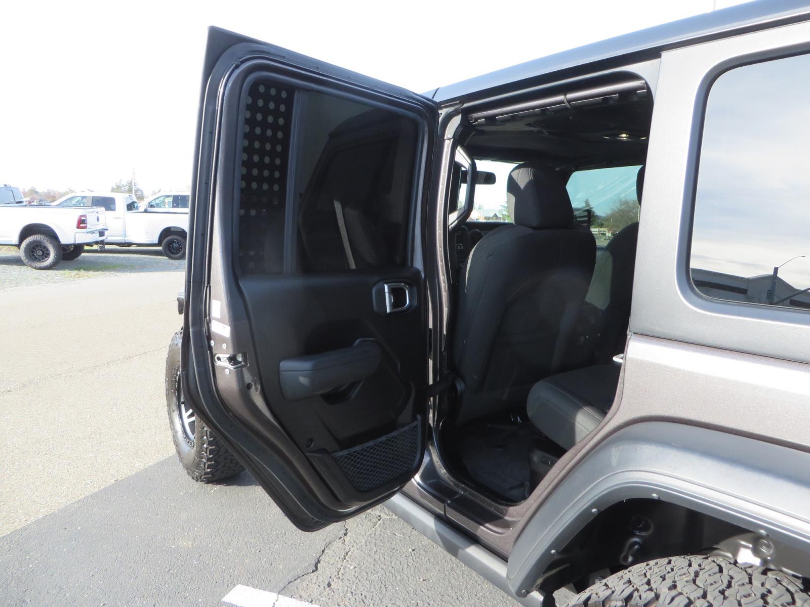 2023 CHARCOAL /black Jeep Wrangler Unlimited Willys 4XE (1C4JJXN68PW) with an 2.0L L4 DOHC 16V HYBRID engine, 8A transmission, located at 2630 Grass Valley Highway, Auburn, CA, 95603, (530) 508-5100, 38.937893, -121.095482 - 3" Zone Offroad lift kit, Fox Adventure series shocks, 17" Method Race wheels, 37" BFG KO2 tires, and a Teraflex spare tire carrier. - Photo #33